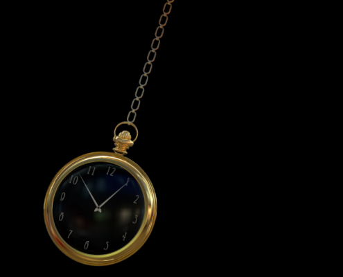 Gold pocket watch on chain symbolizing expatriate tax deadline