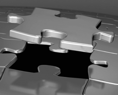Metal puzzle piece symbolising double taxation agreement clarity